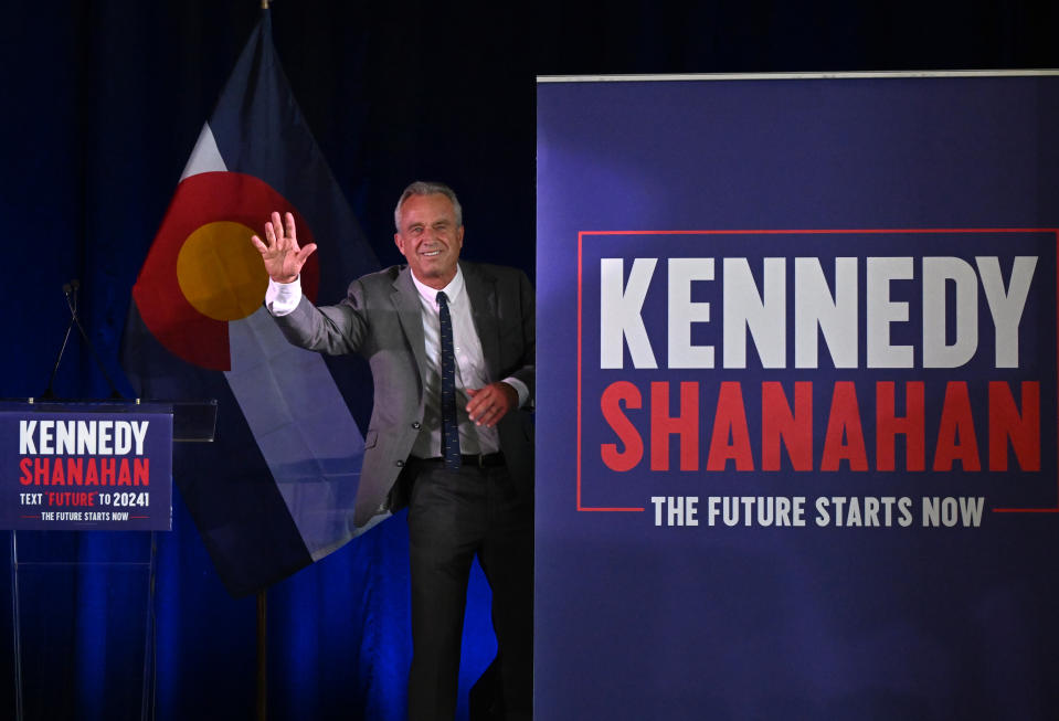 AURORA, CO - MAY 19: Independent presidential candidate Robert F. Kennedy Jr. waves to the crowd as he leaves the stage after speaking during an election rally at The Hangar at Stanley Marketplace in Aurora, Colorado on May 19, 2024 Kennedy spoke about his plans for 