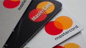 Close up of a stack of Mastercard credit and debit cards.