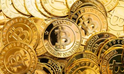 Bitcoin cryptocurrency background. A bunch of golden bitcoin, Digital currency