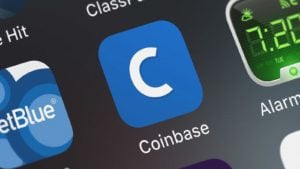 The Coinbase (COIN) app displayed on an iPhone screen.