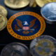 Cryptocurrencies should be regulated by the SEC under the Howey test to protect investors and enforce securities laws