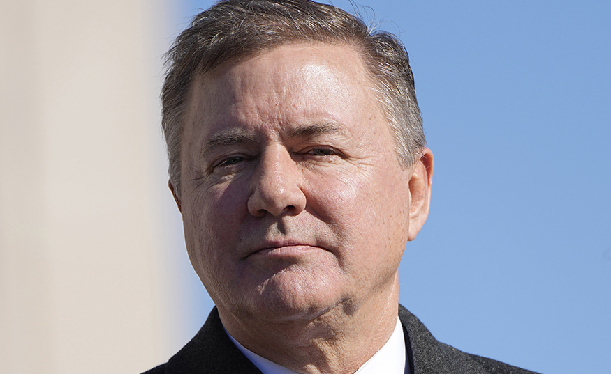 Oklahoma Attorney General Gentner Drummond stands during the playing of the national anthem during his inauguration ceremony on Jan. 9 in Oklahoma City. (AP File Photo/Sue Ogrocki)